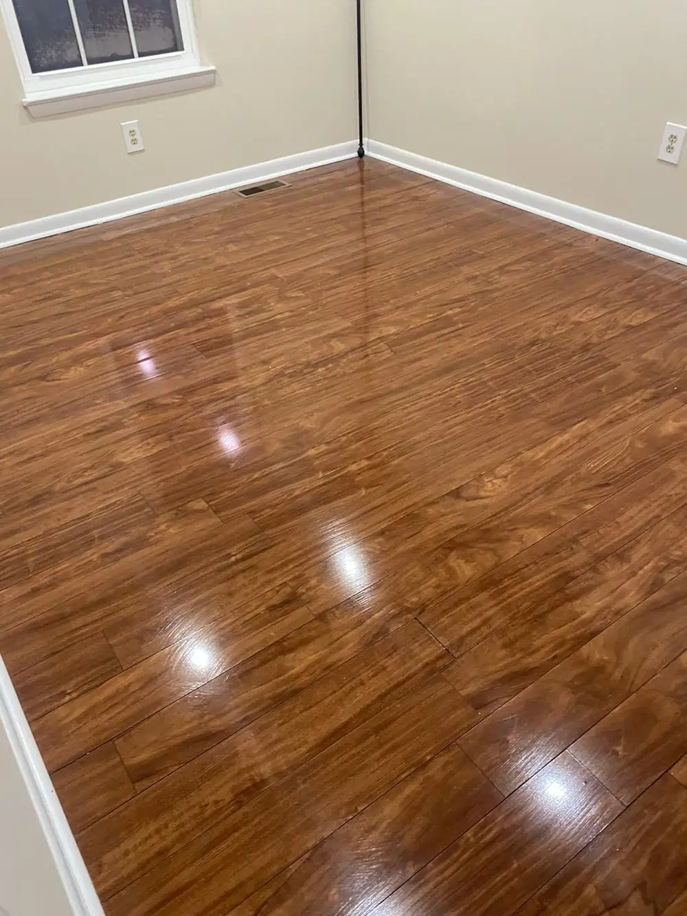 Empty room with cleaned hardwood floor